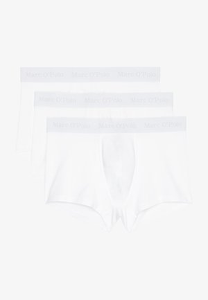 Caleçons en coton blanc, vendus par lot de trois. Ils présentent un design doux et sans couture, avec une taille élastique grise affichant le nom de la marque.
