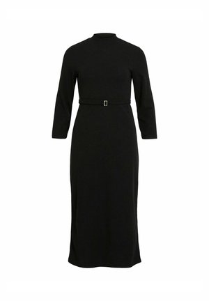 Vestido negro de manga larga que presenta un cuello alto, una cintura ceñida con un hebilla cuadrada y una silueta recta de largo hasta el suelo. Textura suave.
