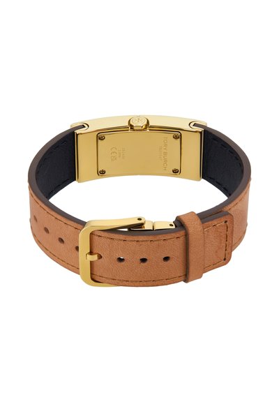 Brunt læderurrem med guldfarvet spænde og rektangulær guldfarvet urskive bagside indgraveret med Tory Burch-mærket.