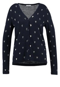 Cardigan blu navy con maniche lunghe, chiusura a bottoni e modelli a cuore in rilievo di colore crema. Materiale in maglia morbido, con scollatura a V.