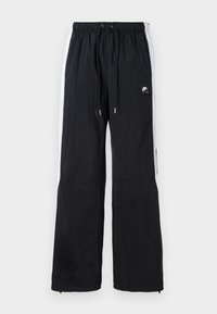AIR PANT - Tracksuit bottoms - black/white