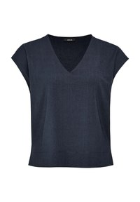 Haut en maille bleu marine foncé sans manches avec col en V et large ourlet, doté d’un tissu subtilement texturé et d’une petite étiquette noire au niveau du col.