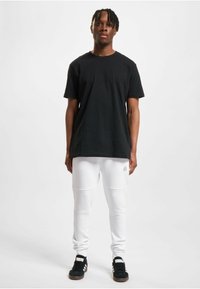 Just Rhyse RAINROCK - Tracksuit bottoms - white