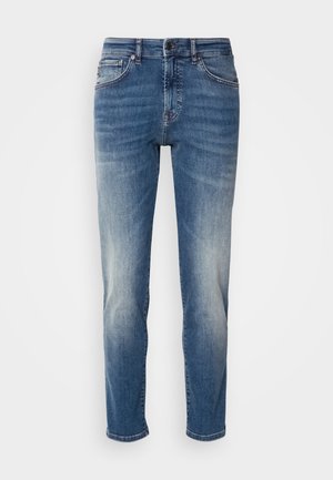 Blue denim jeans featuring a straight leg design, light fading, classic five-pocket styling, and a zip fly with button closure.