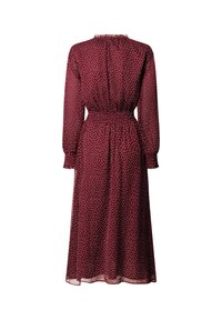 Burgundijas krāsa kleita ar baltām punktiņām, garām piedurknēm, smocked jostasvietu un volānu apkakli, izgatavota no vieglas, mīkstas auduma.