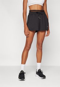 Puma PAMELA REIF SHORTS - Sporta šorti - black