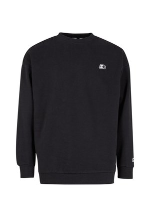 Sort crewneck sweatshirt lavet af bomuld, med lange ærmer, ribbede manchetter og et lille logo på venstre bryst. Glat tekstur.