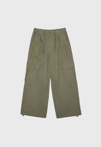 Pantalon cargo pantalon large vert olive avec taille élastique, cordon, poches avant à rabat, poches latérales et cordons aux chevilles.
