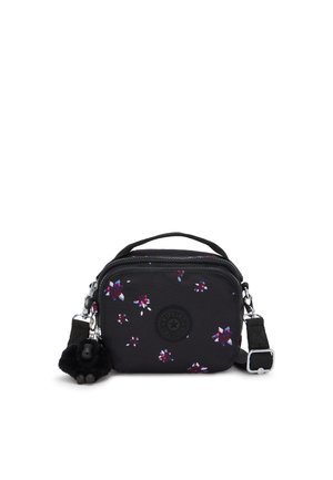 Black fabric bag with floral pattern in purple and white. Features a zip closure, adjustable strap, and a black furry charm accent.
