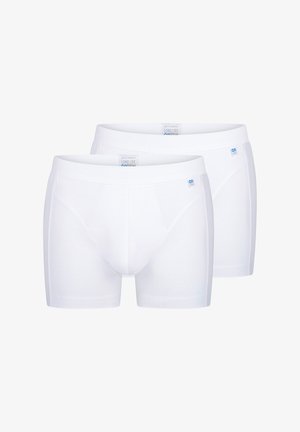 Two white cotton boxer shorts with a smooth texture and elastic waistband, featuring a small blue logo tag on one side.