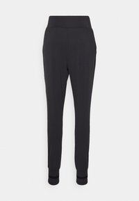 Schwarze Jogginghose mit hohem Bund, schmal zulaufenden Bündchen und weichem Material. Verfügt über seitliche Taschen und einen glatten, dehnbaren Stoff.