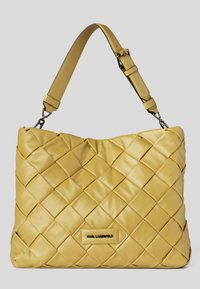 Yellow woven leather handbag with adjustable shoulder strap and metal "KARL LAGERFELD" logo plaque on front.