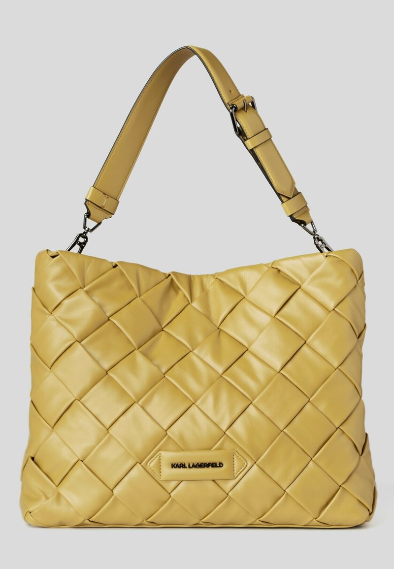 Yellow woven leather handbag with adjustable shoulder strap and metal "KARL LAGERFELD" logo plaque on front.