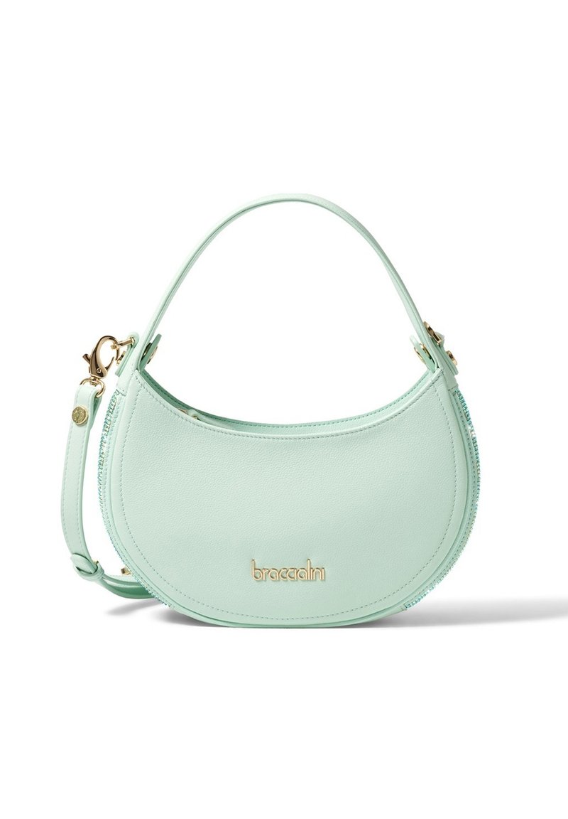 Mintgrüne Lederhandtasche mit geschwungener Form, goldener Hardware und abnehmbarem Tragegurt. Auffälliges Markenlogo auf der Vorderseite.