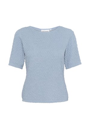 Light blue textured blouse with short sleeves, round neckline, and wavy pattern. Made of a soft, stretchy fabric.