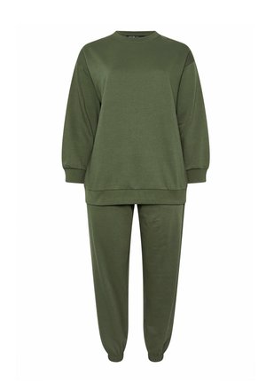 Sweatshirt oversize vert olive avec manches longues et pantalon de jogging assorti à poignet élastique.