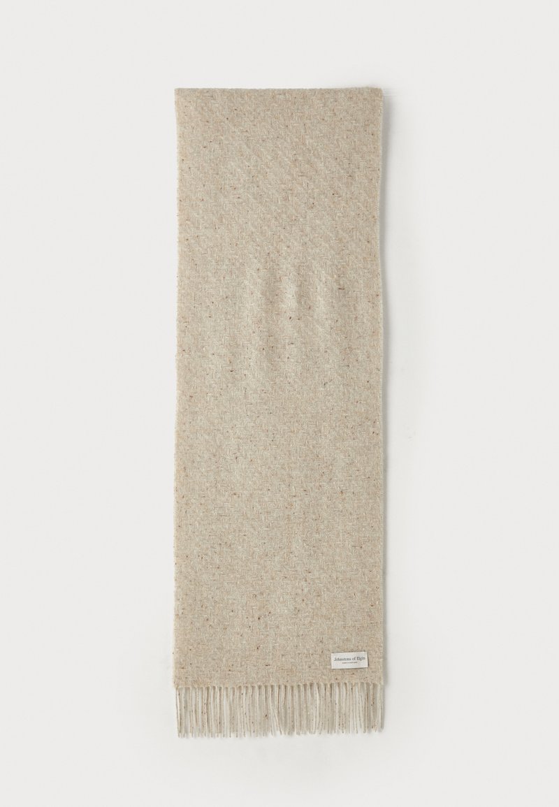 Beige woven scarf made of soft material, featuring light flecks, fringed edges, and a small label at the bottom corner.