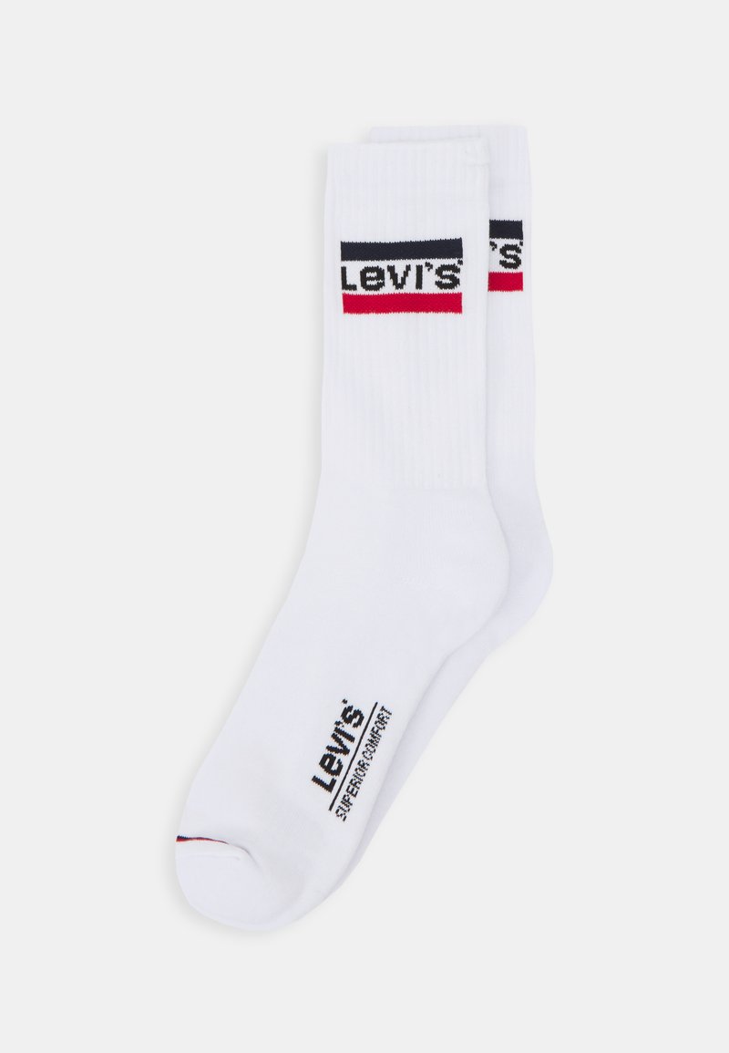 Chaussettes en coton blanches avec des accents de logo Levi's rouge et noir. Présentent une texture côtelée et une zone de renfort au niveau des orteils pour plus de durabilité.
