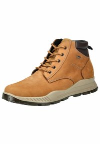 Stivali alla caviglia in suede marrone con dettagli neri, design con lacci, colletto imbottito e suola in gomma texturizzata per una migliore trazione.