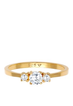 Bague en or avec trois pierres précieuses rondes et transparentes, la centrale étant plus grande, intérieur du jonc estampillé "925" et une petite forme de diamant.