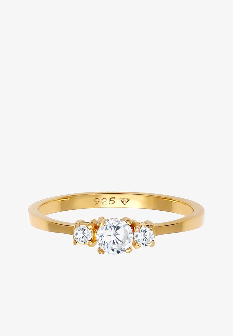 Bague en or avec trois pierres précieuses rondes et transparentes, la centrale étant plus grande, intérieur du jonc estampillé "925" et une petite forme de diamant.