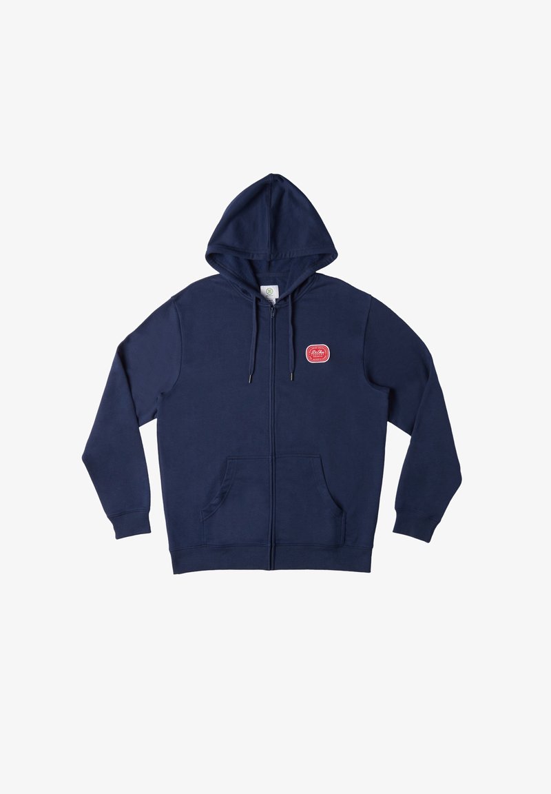 Námořnická modrá mikina na zip vyrobená z měkkého fleecového materiálu, s nášivkou na přední straně, kapucí na stahování a dvěma bočními kapsami.