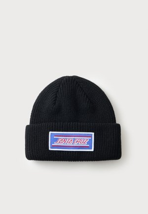 Black knitted beanie hat with folded cuff and rectangular blue patch reading "Santa Cruz" in red and white lettering.