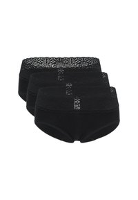 Set di biancheria intima in cotone nero con cinturino in pizzo. Il design include un bordo ondulato con motivi floreali, composto da tre pezzi impilati.