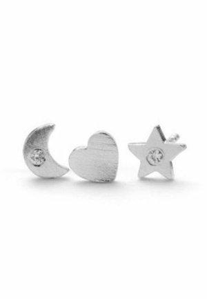 Three silver stud earrings shaped as a crescent moon, heart, and star, each with a small clear gemstone in the center.