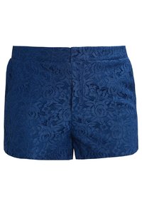 Shorts en dentelle bleu marine avec un motif floral et une texture lisse, présentant une coupe ajustée et une taille simple.