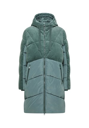 Gewatteerde jack in een rustige groene kleur met corduroy en gladde stoftexturen, een capuchon en ritssluitingen, met een geometrisch ontwerp.