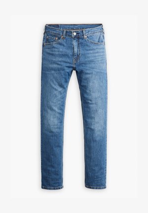 Lichtblauwe denim jeans met een rechte pijp, vijf zakken en een klassieke knopen- en ritsluiting. Subtiele versleten textuur.