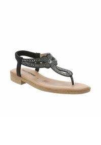 Sandalia negra con suela plana, tira decorativa con tachuelas, estilo de punta abierta y tira elástica en el talón para un ajuste seguro. Suela con textura de madera.