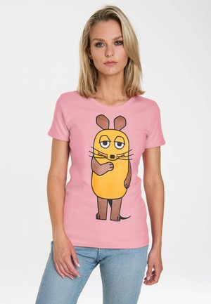Pink cotton t-shirt featuring a cartoon character with yellow body, brown accents, and expressive features. Simple crew neck design.