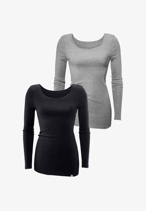 Kaks pikkade varrukatega särki: üks must ja teine hall. Mõlemal on ümar kaelus, kitsas lõige ja pehme, venitav kangas.