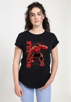 Schwarzes Baumwoll-T-Shirt mit einem Grafikdesign eines muskulösen roten Charakters und dem Text "RED HULK" in Rot auf der linken Seite. Kurze Ärmel, lockere Passform.
