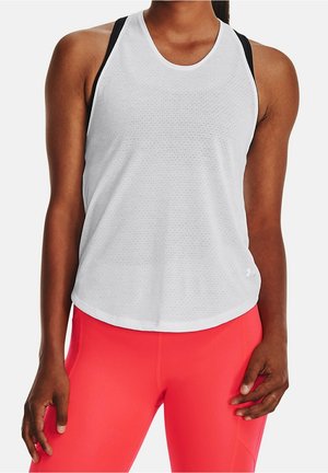 Woman wearing white athletic tank top with black straps and bright pink leggings, shown from neck to hips.