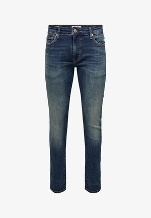 Tume sinised teksapüksid plekilise viimistlusega, millel on nööpidega sulgumine, viie taskuga disain ja kitsenevad sääred.