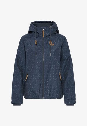 Granatowa kurtka z kapturem w białe kropki, z zamkiem błyskawicznym z przodu, kapturem na sznurek oraz zapinanymi na zamek bocznymi kieszeniami z brązowymi uchwytami.