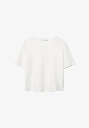 T-shirt blanc à manches courtes en coton. Doté d'un col ras du cou et d'une coupe décontractée. Texture lisse sans motifs ni accents visibles.