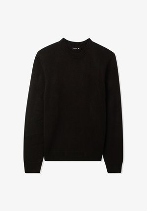 Maglione nero in maglia con collo rotondo, maniche lunghe e polsini e orlo a coste. Tessuto dal design strutturato con un colore uniforme.