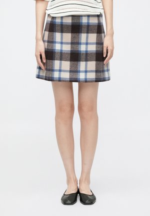 Kockás szoknya gyapjúkeverékből, sötétbarna, bézs és kék mintázattal. A-vonalú szabás, rövid hosszal, sima textúrával.
