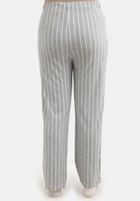 Women's gray and white striped trousers featuring a relaxed fit, elastic waistband, and smooth fabric with subtle texture.