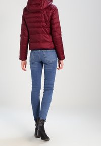 Vero Moda Piumino - dark red