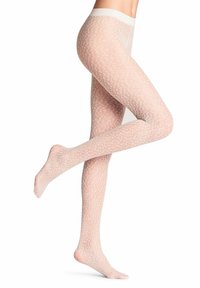 Collants transparents à motifs en beige clair, ornés d'un délicat motif floral blanc. La taille douce et la texture transparente mettent en valeur les jambes.