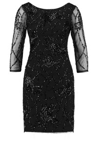 Svart klänning med genomskinliga tre fjärdedels ärmar, intrikata pärlade blommönster och en åtsittande silhuett. Rund halsringning och knälång fåll.