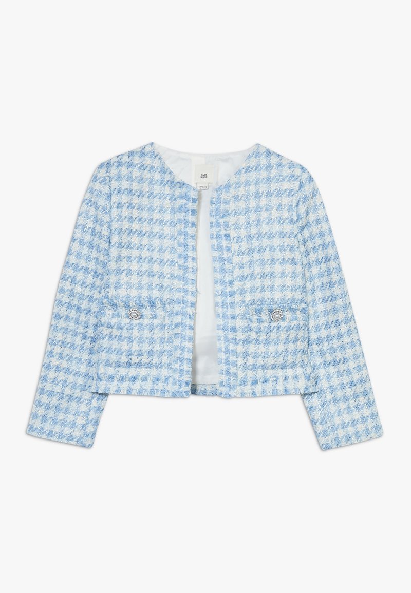 Veste en tweed bleu et blanc à carreaux avec un col rond, des manches longues et deux poches avant ornées de boutons décoratifs. Texture légère.