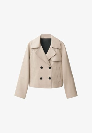 Beżowa skrócona kurtka wykonana z gładkiego materiału. Posiada szeroki kołnierz, podwójne zapięcie na czarne guziki oraz szerokie rękawy.