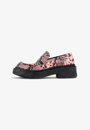 Pink and black snake-print loafers with a chunky black platform sole and textured upper. Slip-on design with a flat heel.