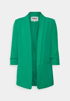 Blazer vert pour femme avec manches trois-quarts, devant ouvert et revers fins, présenté sur un fond clair uni.